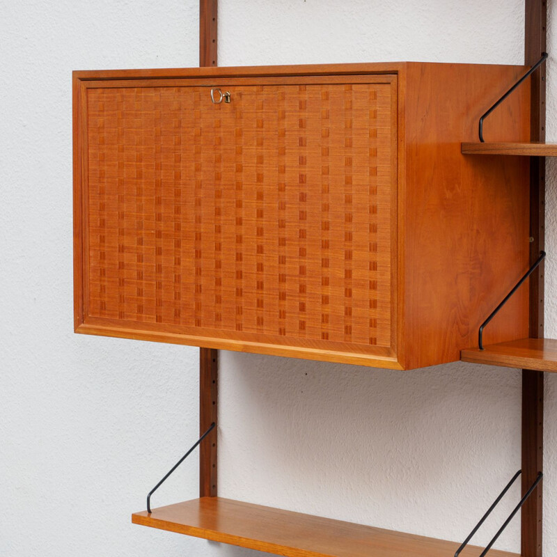Vintage Danish shelving system in teak by Poul Cadovius