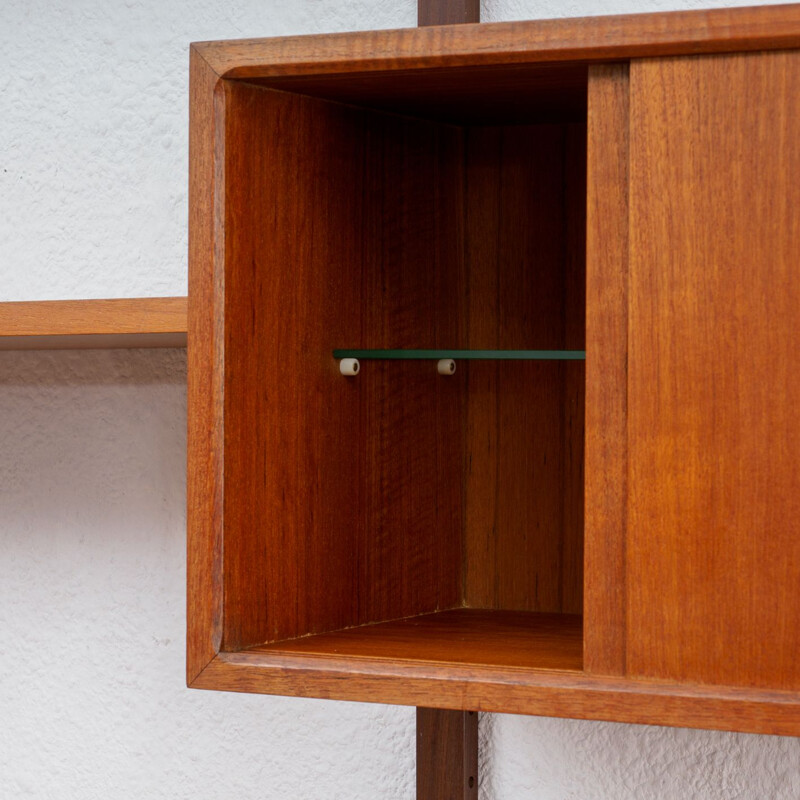 Vintage Danish shelving system in teak by Poul Cadovius