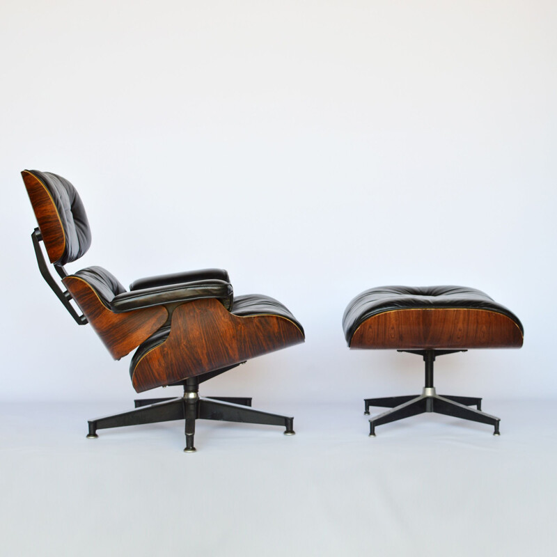 Lounge chair and footstool in rosewood by Eames for Herman Miller 1979