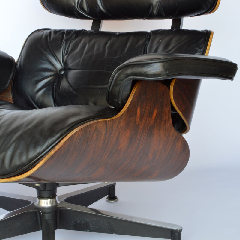 Lounge chair and footstool in rosewood by Eames for Herman Miller 1979