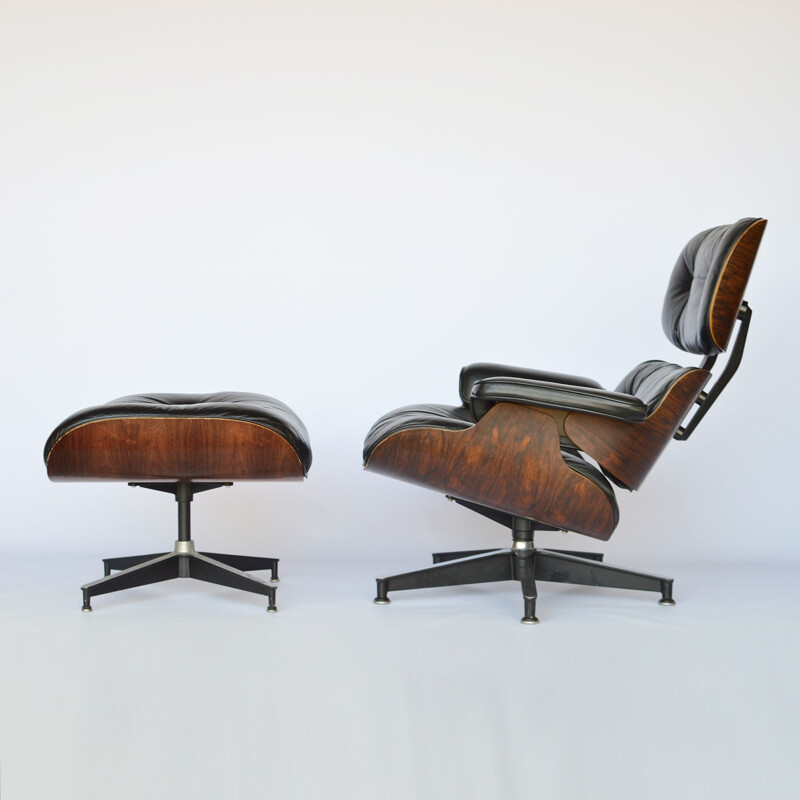 Lounge chair and footstool in rosewood by Eames for Herman Miller 1979