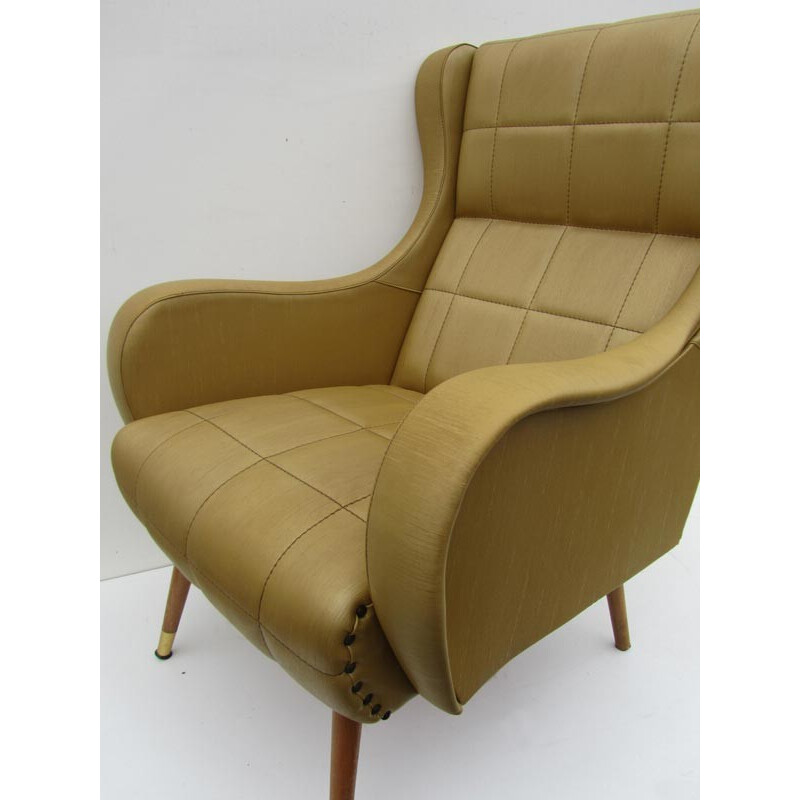 Vintage lounge chair in leatherette, wood and brass - 1960s
