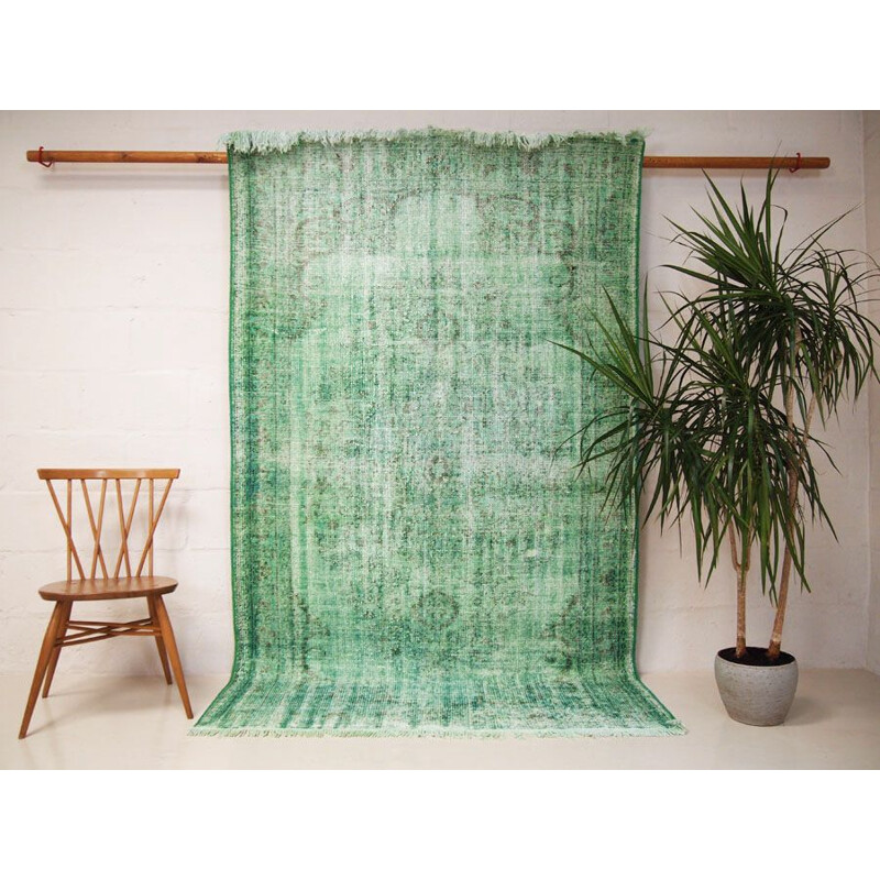 Vintage green over dyed traditional turkish rug