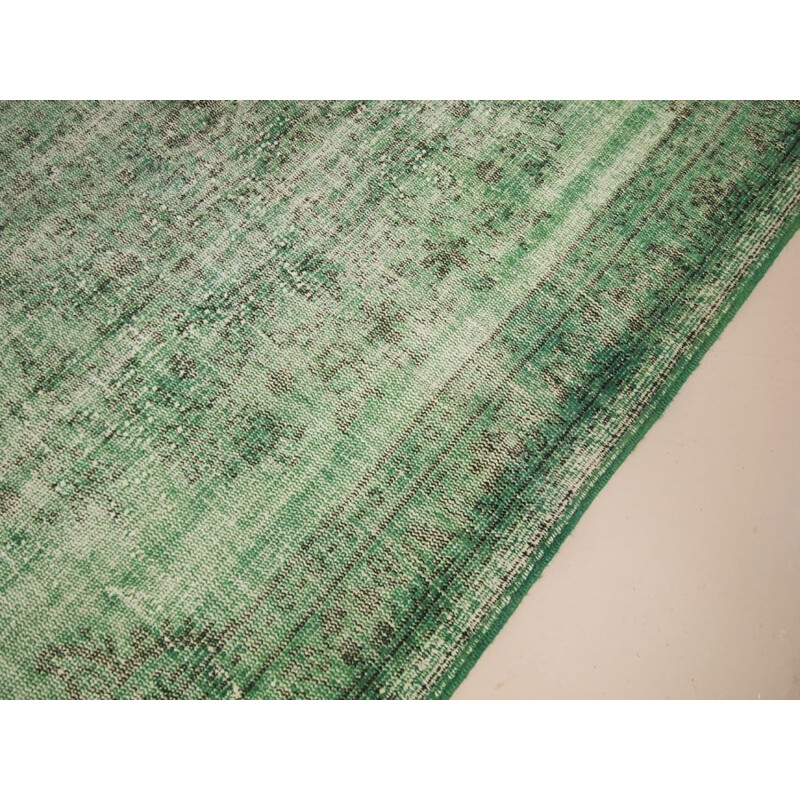 Vintage green over dyed traditional turkish rug