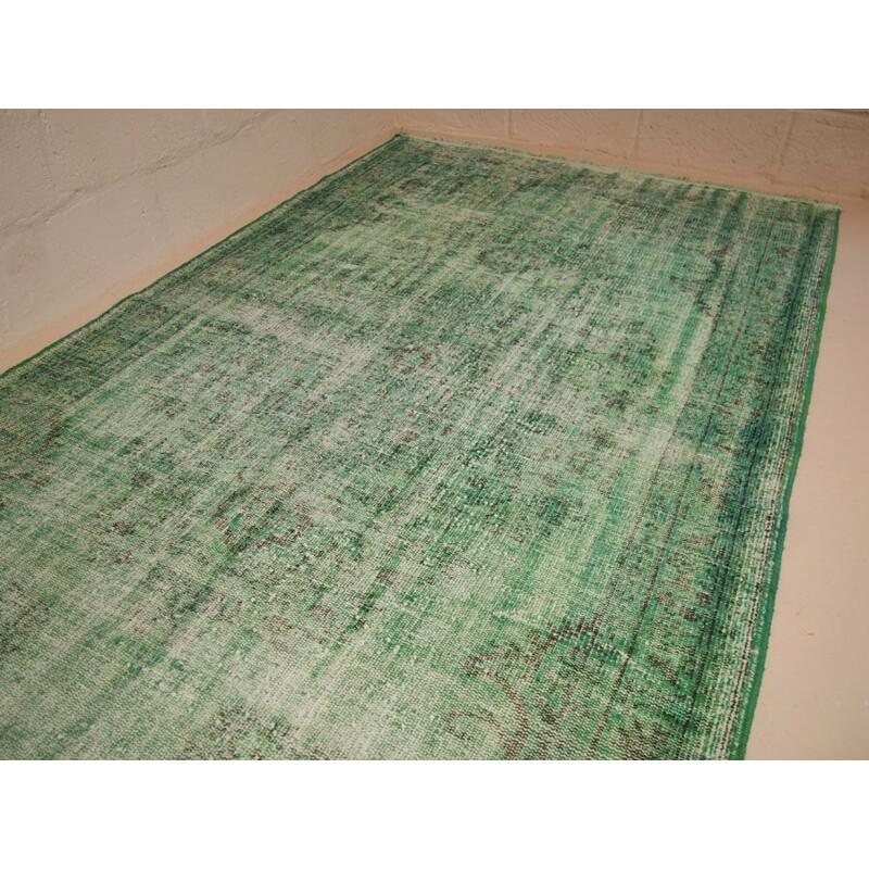 Vintage green over dyed traditional turkish rug