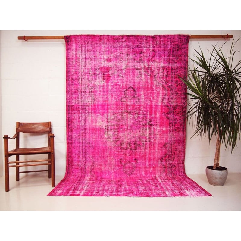 Vintage traditional Turkish rug in cerise pink