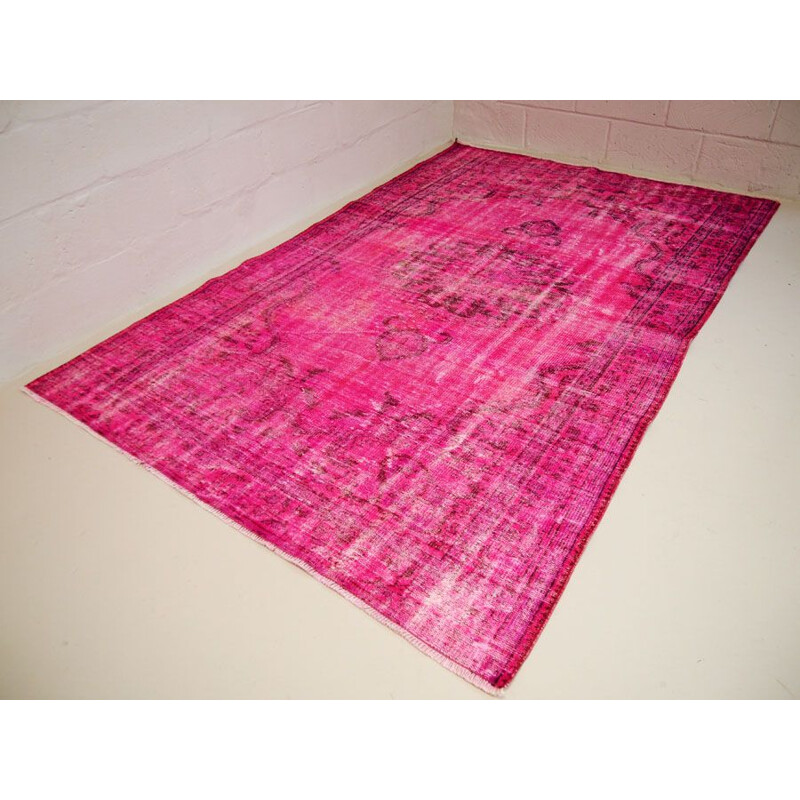 Vintage traditional Turkish rug in cerise pink