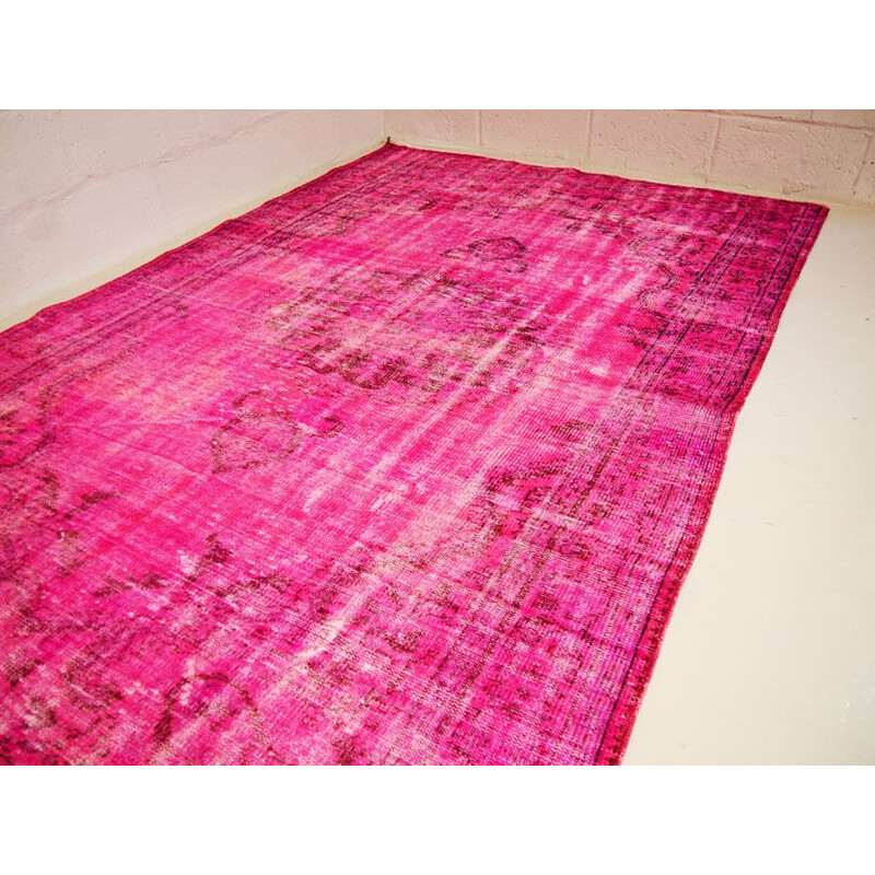 Vintage traditional Turkish rug in cerise pink