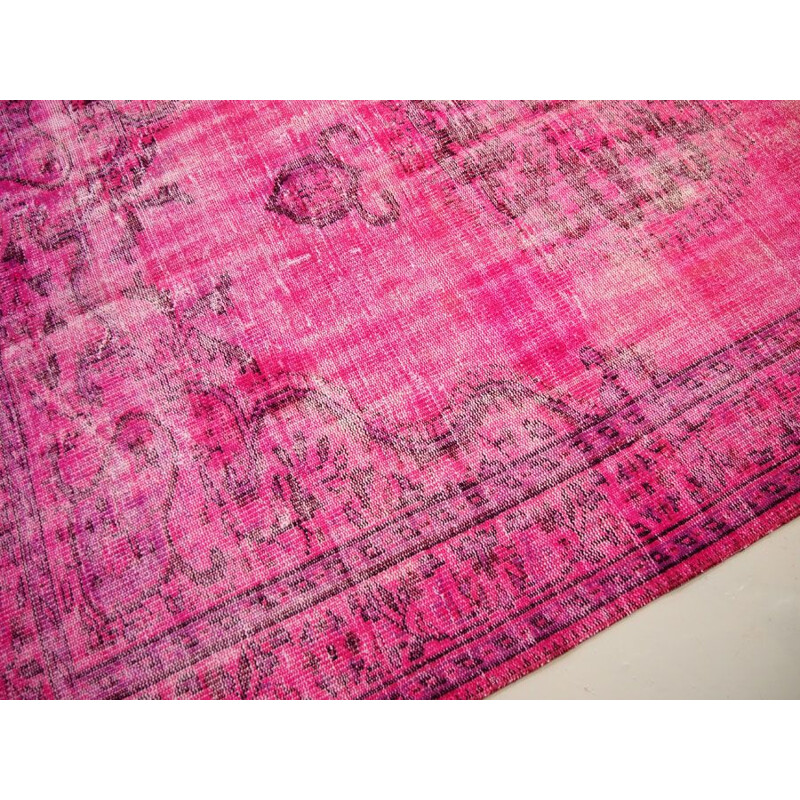 Vintage traditional Turkish rug in cerise pink