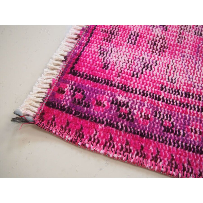 Vintage traditional Turkish rug in cerise pink