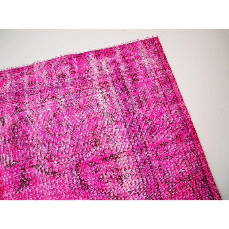 Vintage traditional Turkish rug in cerise pink