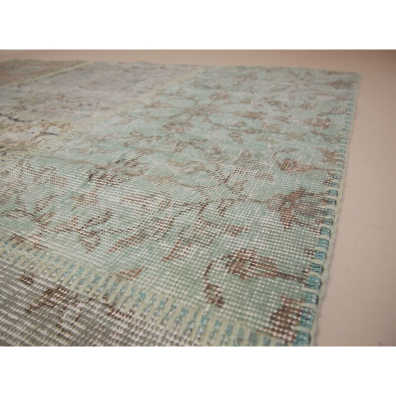 Vintage Turkish rug in light turquoise