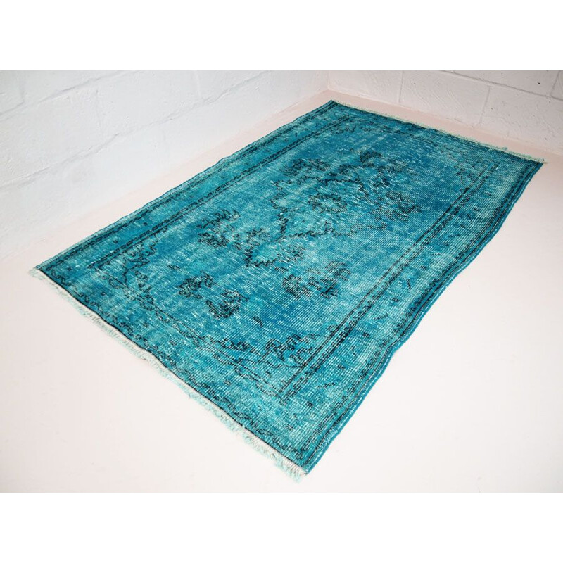 Vintage Turkish rug in deep blue with shades of turquoise