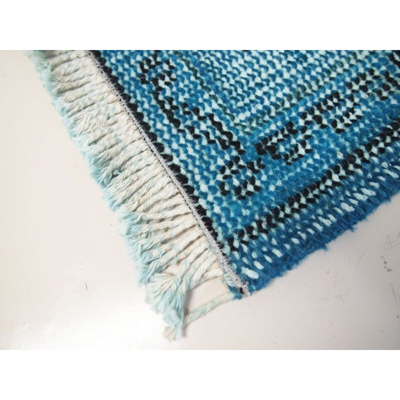 Vintage Turkish rug in deep blue with shades of turquoise