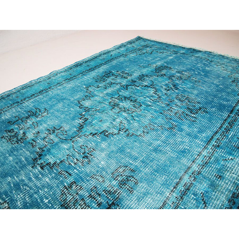 Vintage Turkish rug in deep blue with shades of turquoise