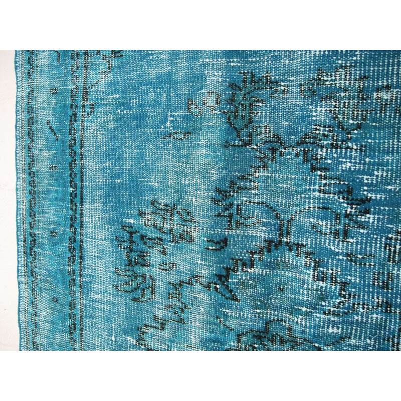 Vintage Turkish rug in deep blue with shades of turquoise