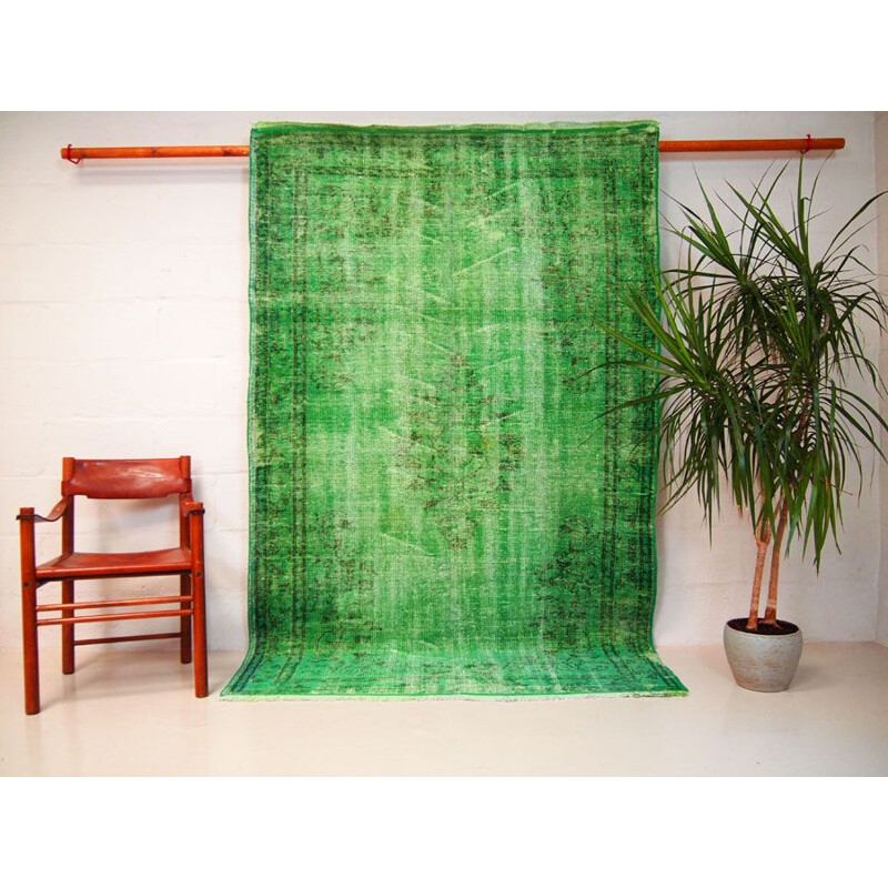 Vintage green dyed traditional Turkish rug