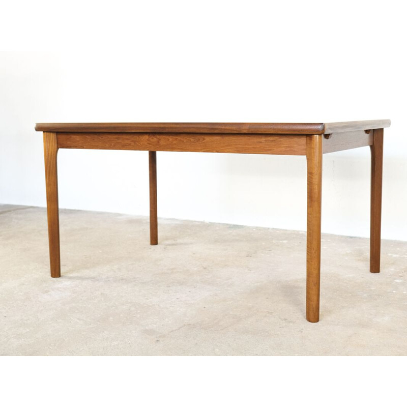 Vintage dining table in teak by Henning Kjaernulf