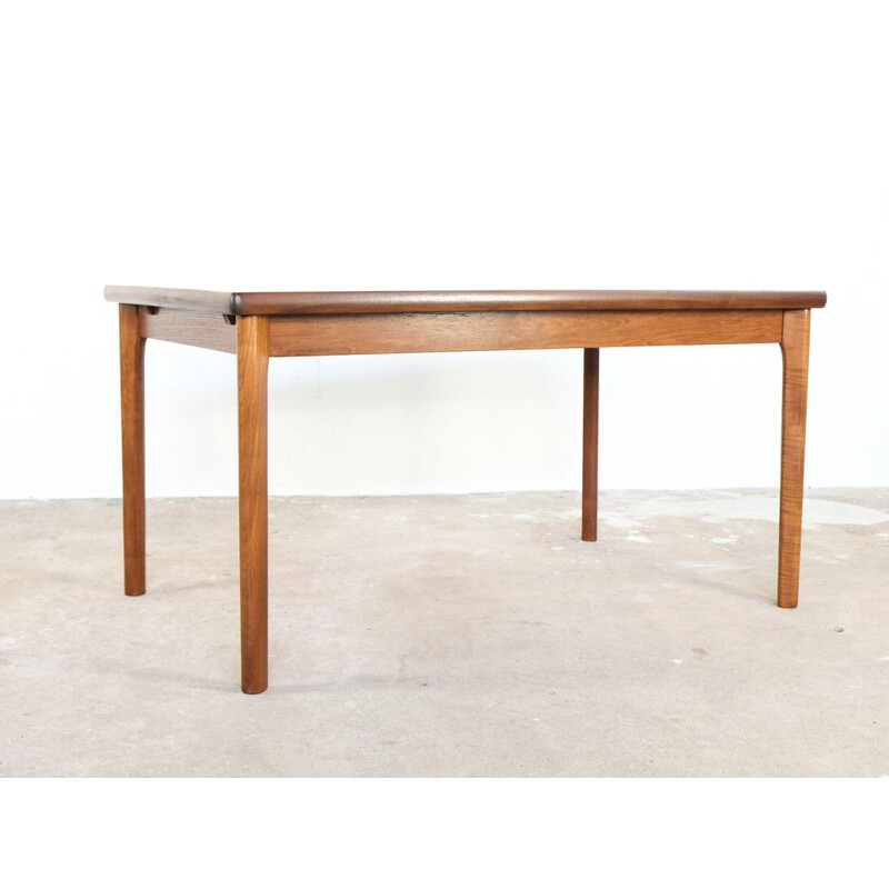 Vintage dining table in teak by Henning Kjaernulf