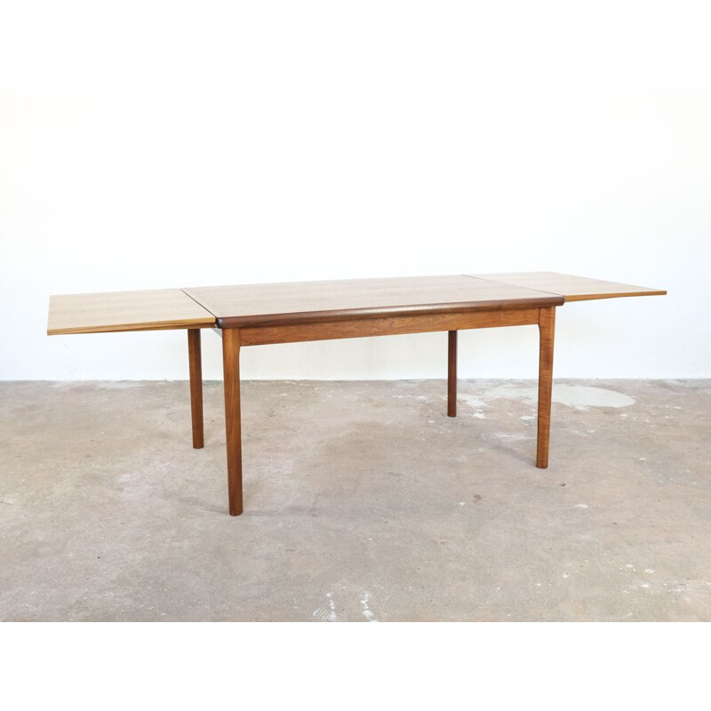 Vintage dining table in teak by Henning Kjaernulf