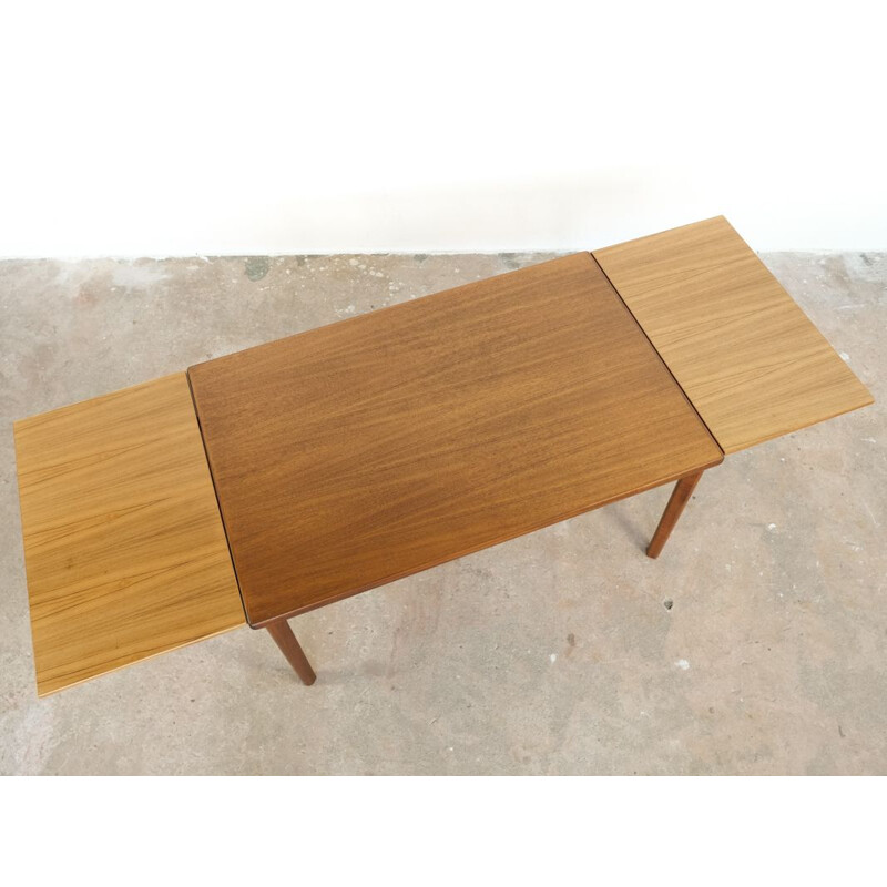 Vintage dining table in teak by Henning Kjaernulf