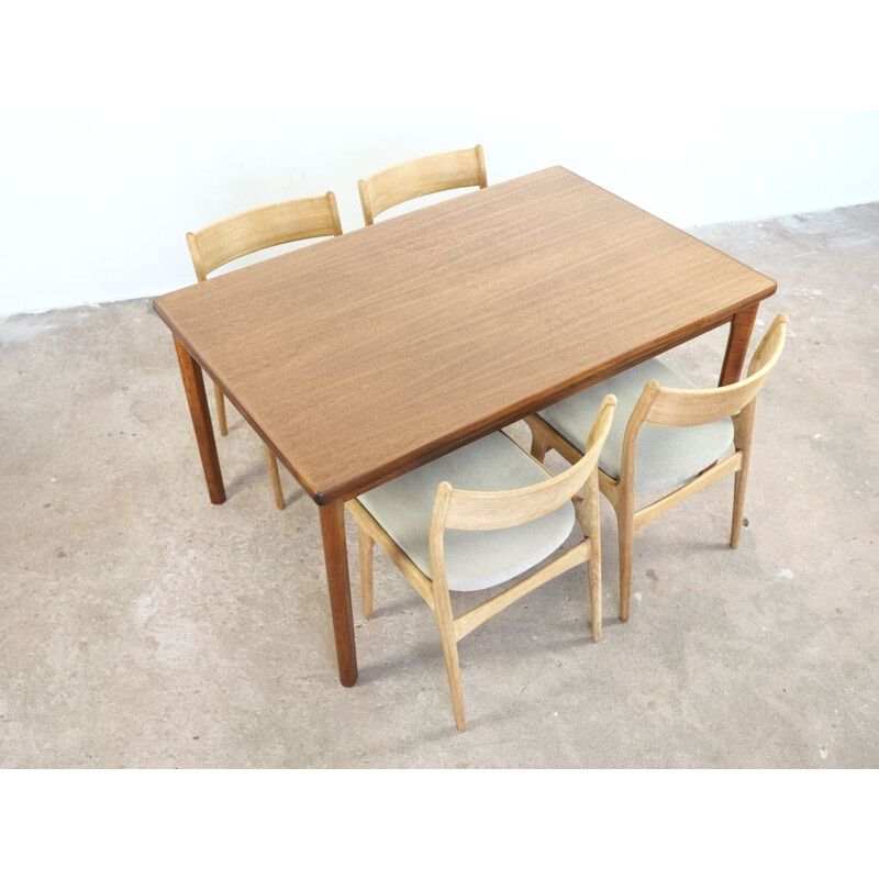 Vintage dining table in teak by Henning Kjaernulf