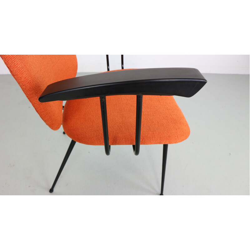 Vintage orange armchair in metal and bakelite