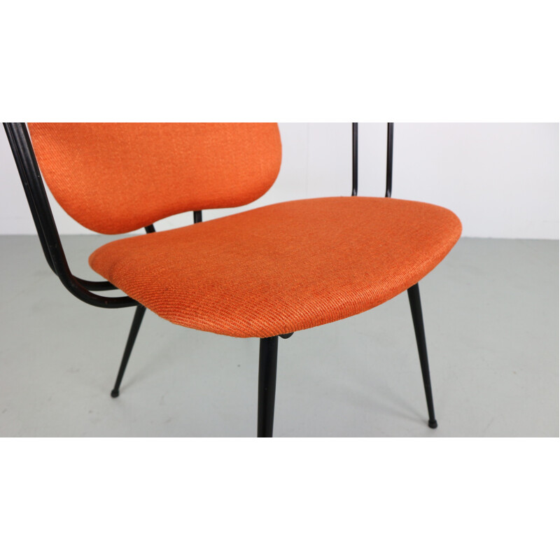 Vintage orange armchair in metal and bakelite