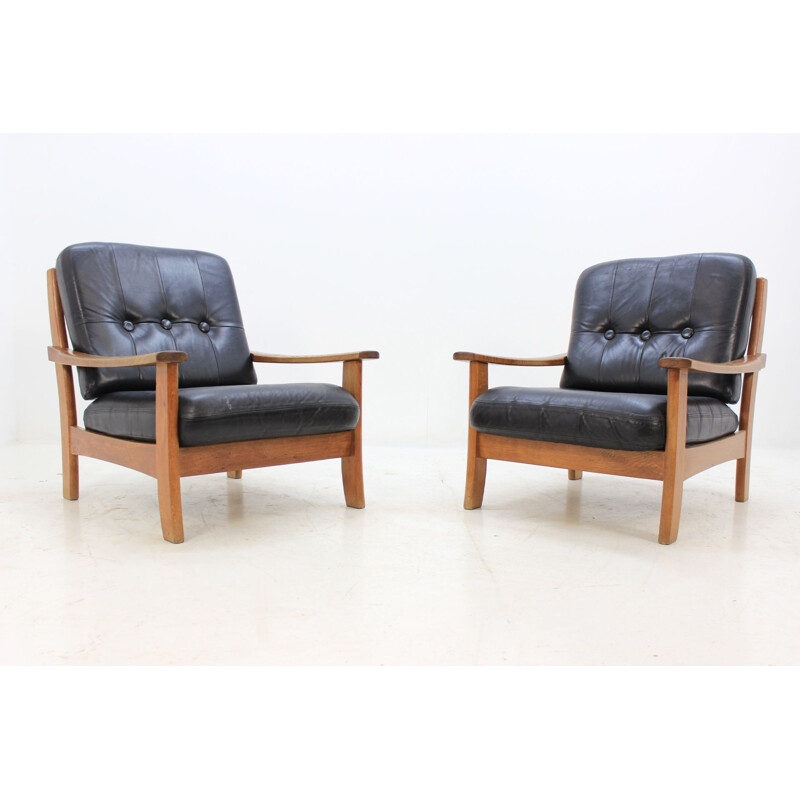 Set of 2 vintage scandinavian armchairs in black leather