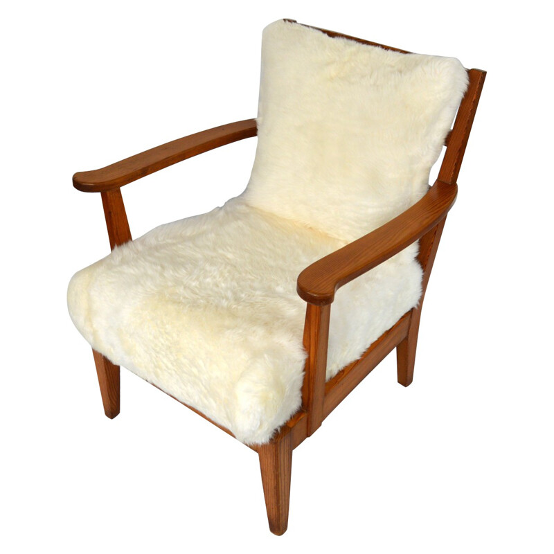 Vintage Utö-lovö armchair in pine and sheepskin by Axel Einar Hjorth, 1940