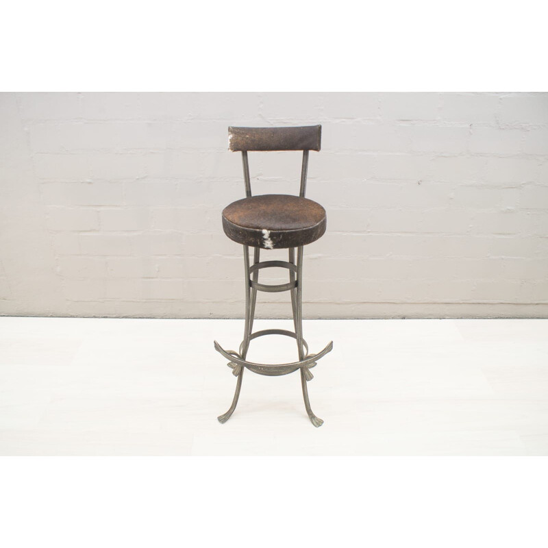 Pair of vintage iron and cowhide bar stools, 1960