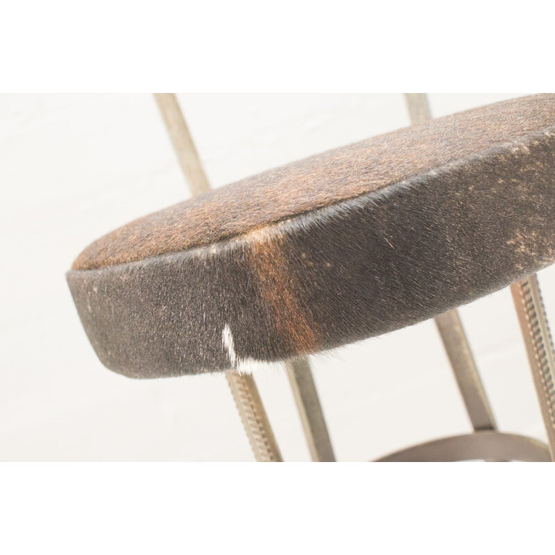 Pair of vintage iron and cowhide bar stools, 1960