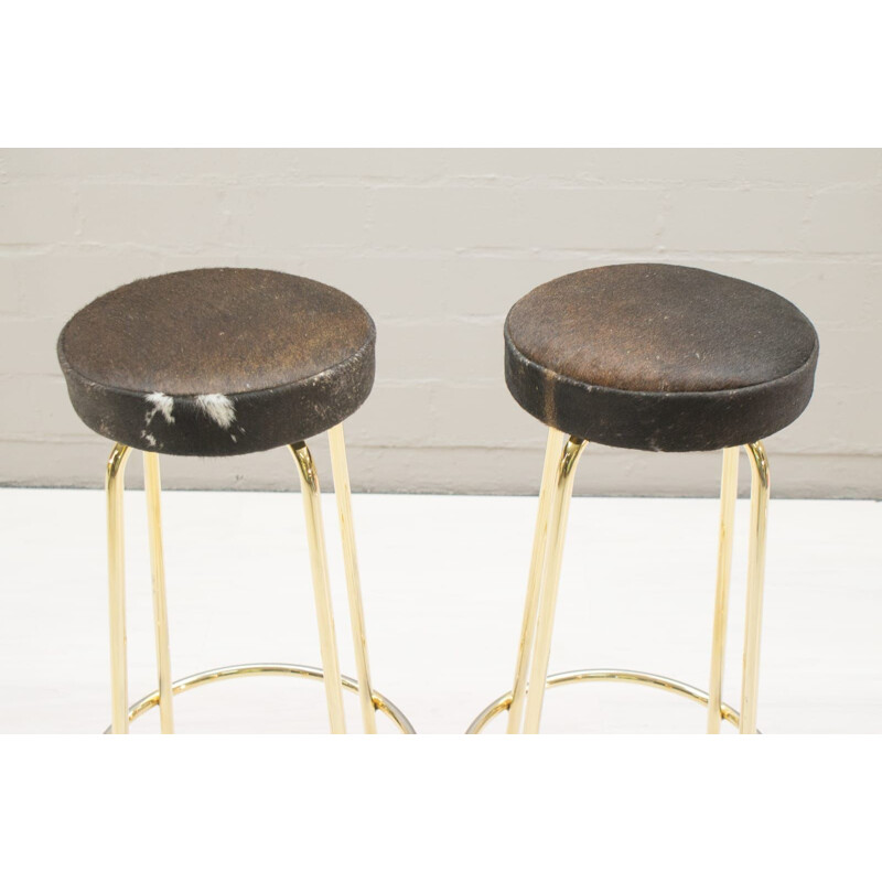 Set of 2 vintage Hollywood Regency golden and Cowhide Bar Stools