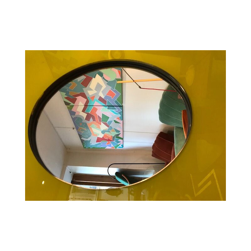 Vintage circular mirror in pop yellow