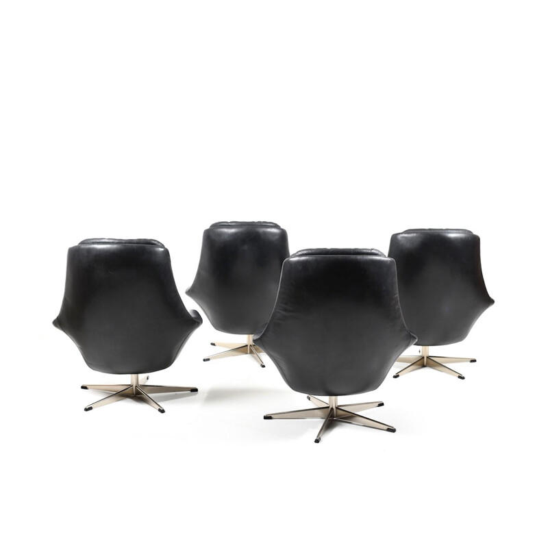 Set of 4 vintage black leather swivel lounge chair by H. W. Klein