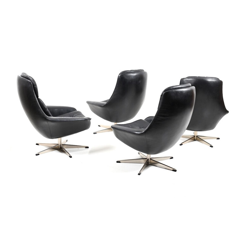 Set of 4 vintage black leather swivel lounge chair by H. W. Klein