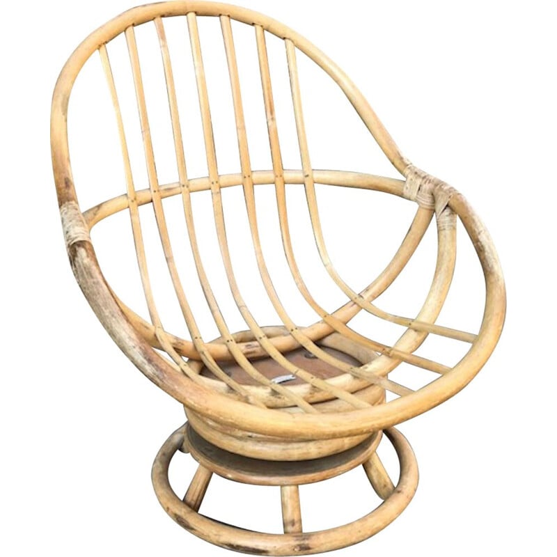 Vintage swivel chair in rattan