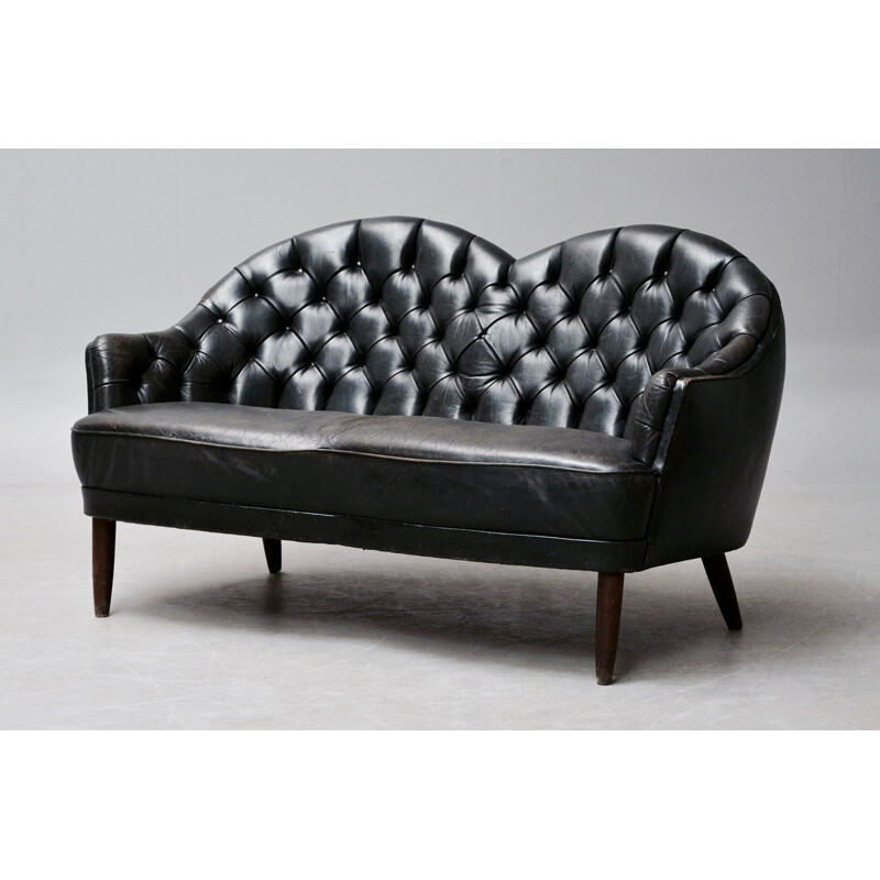 Vintage 2-seater sofa in black leather