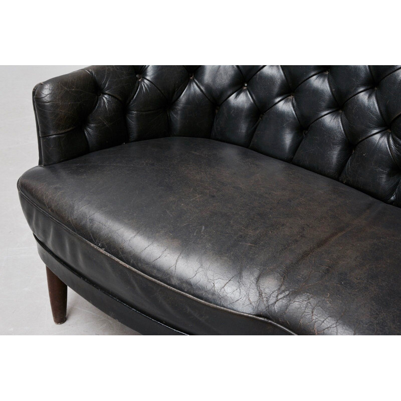 Vintage 2-seater sofa in black leather