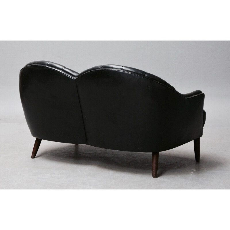 Vintage 2-seater sofa in black leather