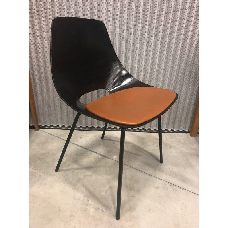 Vintage black lacquered barrel chair by Pierre Guariche