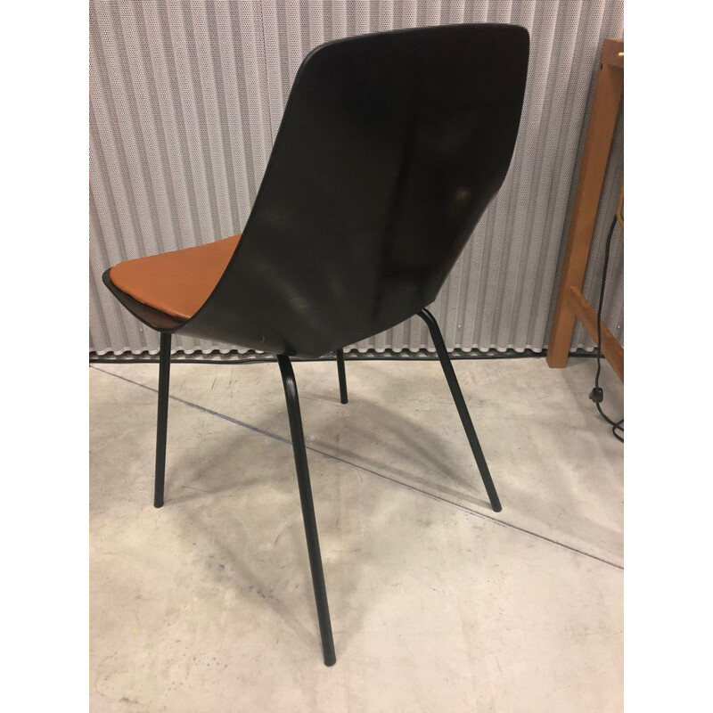 Vintage black lacquered barrel chair by Pierre Guariche