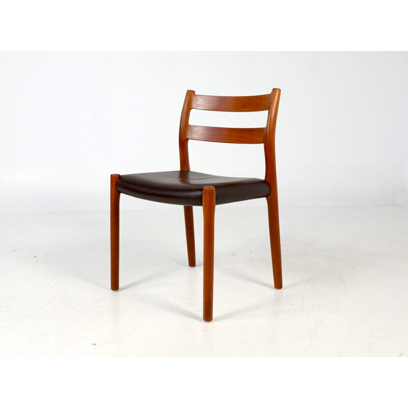 Set of 4 chairs in teak and leatherette - 1970s