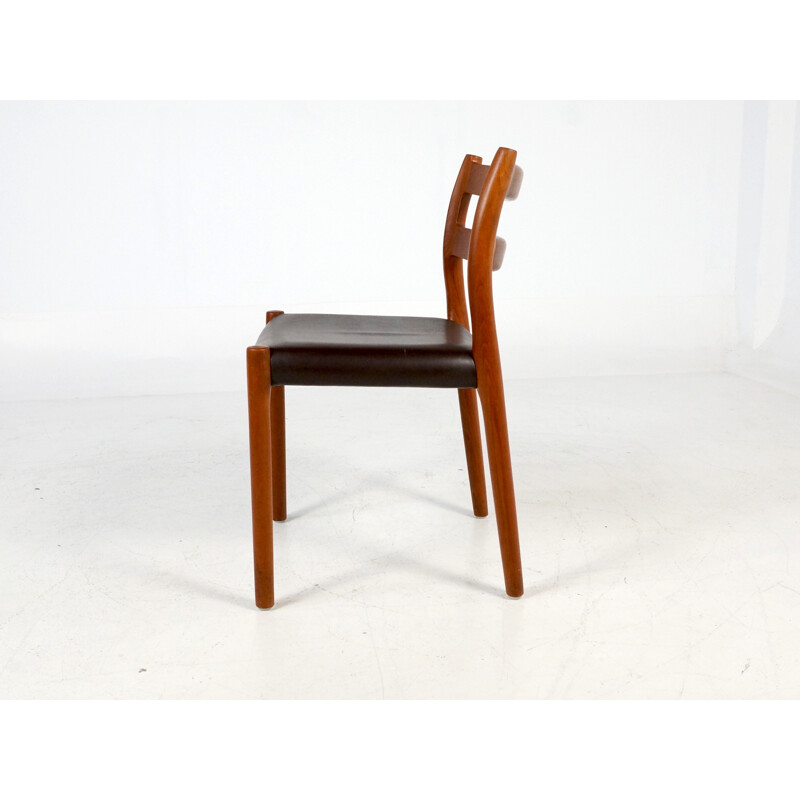 Set of 4 chairs in teak and leatherette - 1970s
