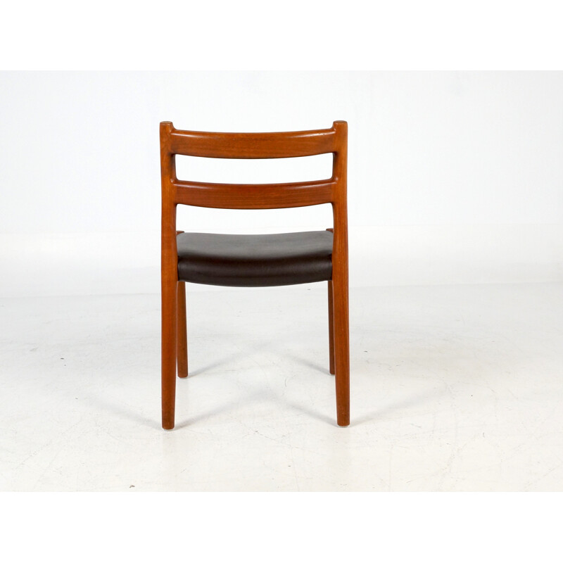 Set of 4 chairs in teak and leatherette - 1970s