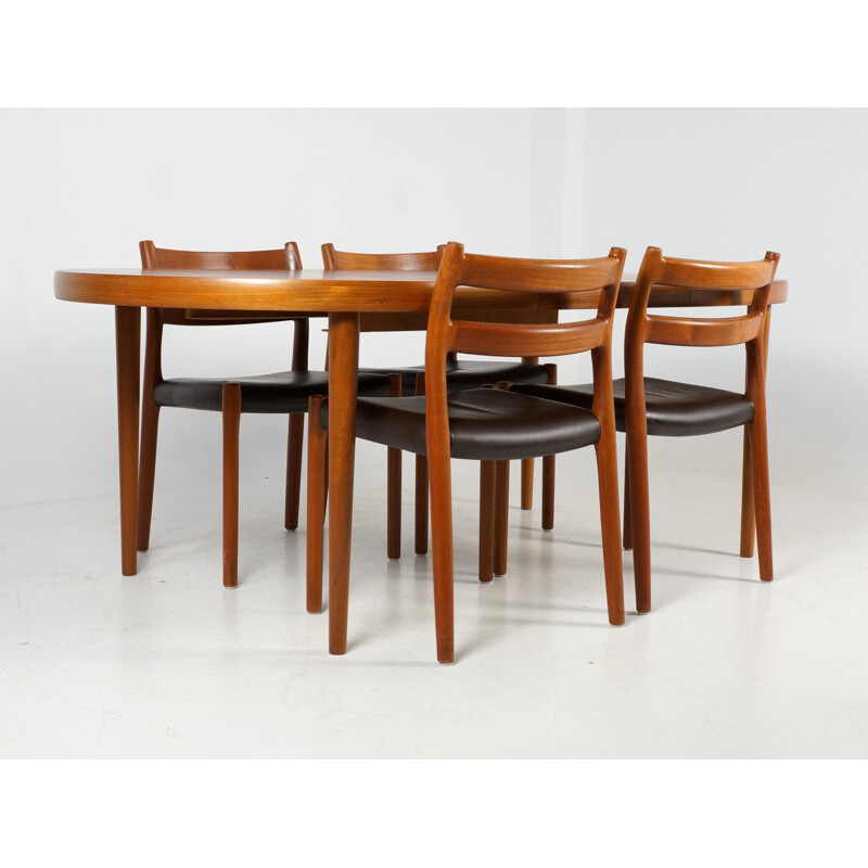 Set of 4 chairs in teak and leatherette - 1970s