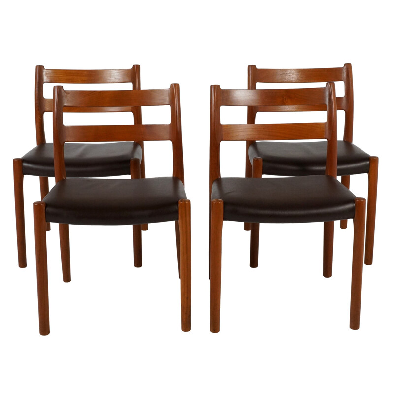 Set of 4 chairs in teak and leatherette - 1970s