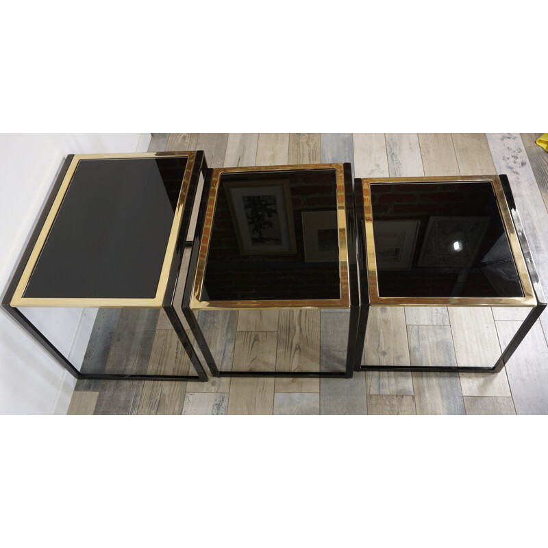 Set of vintage nesting tables in black lacquered metal
