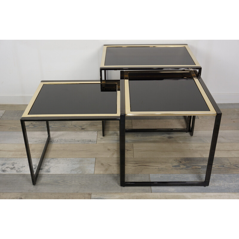 Set of vintage nesting tables in black lacquered metal