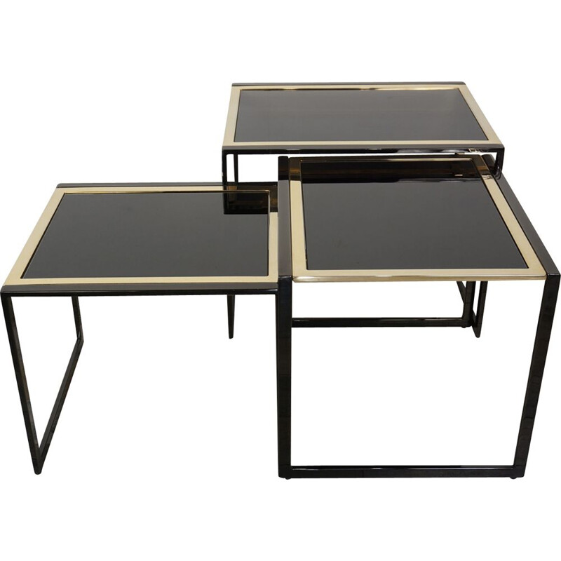 Set of vintage nesting tables in black lacquered metal